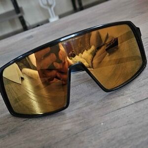 Oakley Black and Gold Sunglasses